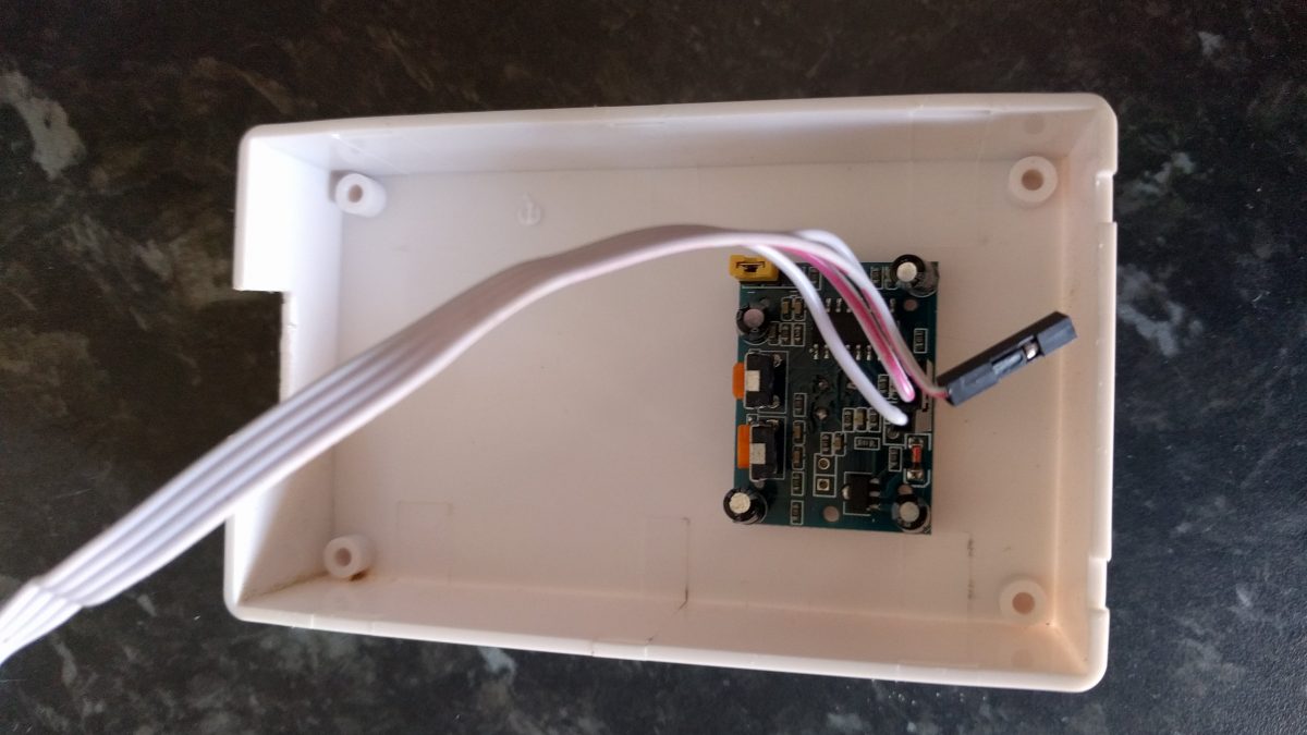 PIR sensor mounted to inside of case.